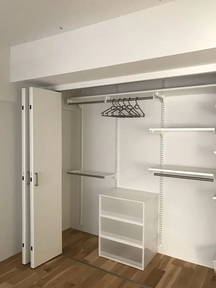 Empty Closet Space and Hangers for Guest Bedroom