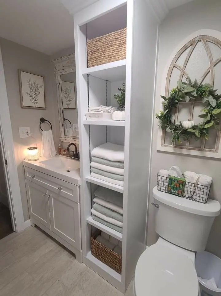 Vertical Storage Cupboard in a Small Bathroom