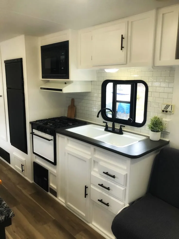 Camper Kitchen Cupboards Painted in White