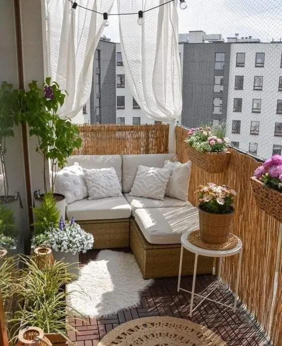 Multipurpose Storage Boxes Used as Seating of the Small Balcony