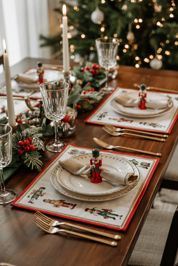 Dining table set with Nutcracker-print placemats and Nutcracker napkin rings in a festive modern interior.